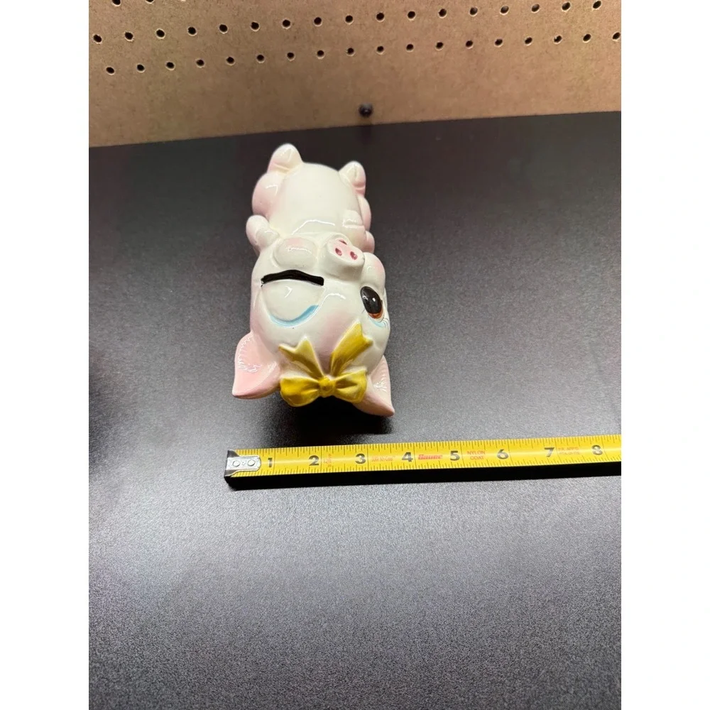 Vintage Japanese Ceramic Piggy Bank with Winking Expression And a Yellow Bow - Picture 10 of 11